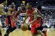 Jan 3, 2014; Washington, DC, USA; Toronto Raptors point guard Kyle Lowry (7) dribbles past Washington Wizards point guard John Wall (2) during the second half at Verizon Center. The Raptors defeated the Wizards 101 - 88. Mandatory Credit: Brad Mills-USA T