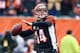 CINCINNATI, OH - DECEMBER 29: Andy Dalton #14 of the Cincinnati Bengals throws a pass during the NFL game against the Baltimore Ravens at Paul Brown Stadium on December 29, 2013 in Cincinnati, Ohio. (Photo by Andy Lyons/Getty Images)