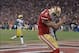 Jan 12, 2013; San Francisco, CA, USA; San Francisco 49ers quarterback Colin Kaepernick (7) celebrates after scoring on a 56-yard touchdown run against the Green Bay Packers in the NFC divisional round playoff game at Candlestick Park. Mandatory Credit: K