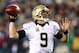 PHILADELPHIA, PA - JANUARY 04: Drew Brees #9 of the New Orleans Saints throws a pass against the Philadelphia Eagles during their NFC Wild Card Playoff game at Lincoln Financial Field on January 4, 2014 in Philadelphia, Pennsylvania. (Photo by Elsa/Get