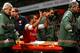 LONDON, ENGLAND - JANUARY 04: The injured Theo Walcott of Arsenal makes a 2-0 gesture to the Tottenham fans as he is stretchered off the pitch during the Budweiser FA Cup third round match between Arsenal and Tottenham Hotspur at Emirates Stadium on Janu
