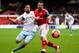 NOTTINGHAM, ENGLAND - JANUARY 05: Sebastian Lletget of West Ham United battles with Andy Reid of Nottingham Forest during the FA Cup with Budweiser Third round match between Nottingham Forest and West Ham United at City Ground on January 5, 2014 in Notti