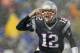 Dec 29, 2013; Foxborough, MA, USA; New England Patriots quarterback Tom Brady (12) signals his teammates at the line of scrimmage during the second quarter against the Buffalo Bills at Gillette Stadium. Mandatory Credit: Winslow Townson-USA TODAY Sports