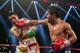 MACAU - NOVEMBER 24: Manny Pacquiao (R) of the Philippines punches Brandon Rios of the U.S. during their 'Clash in Cotai' WBO International Welterweight title fight on November 24, 2013 in Macau. (Photo by Nicky Loh/Getty Images)
