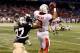 ST PETERSBURG, FL - DECEMBER 21: Receiver Willie Snead #3 of the Ball State Cardinals catches a touchdown pass in front of defender Brandon Alexander #37 of the Central Florida Knights during the Beef 'O' Brady's St Petersburg Bowl Game at Tropicana Fiel