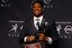 NEW YORK, NY - DECEMBER 14: Jameis Winston, quarterback of the Florida State Seminoles, poses with the trophy during a press conference after the 2013 Heisman Trophy Presentation at the Marriott Marquis on December 14, 2013 in New York City. (Photo by J