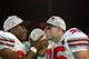 TEMPE, AZ - JANUARY 3: Kenny Peterson #97 (l) and Matt Wilheim #35 of the Ohio State Buckeyes celebrate with the National Championship trophy after defeating the Miami Hurricanes 31-24 in double overtime the Tostitos Fiesta Bowl on January 3, 2003 at Sun