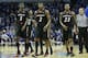 Jan 4, 2014; Memphis, TN, USA; Cincinnati Bearcats forwards Shaquille Thomas (3) Titus Rubles (2) and guard Sean Kilpatrick (23) during the second half against the Memphis Tigers at FedExForum. Cincinnati defeated Memphis 69-53. Mandatory Credit: Nelson C