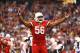 Nov 24, 2013; Phoenix, AZ, USA; Arizona Cardinals linebacker Karlos Dansby (56) celebrates his interception return for a touchdown in the second quarter against the Indianapolis Colts at University of Phoenix Stadium. Mandatory Credit: Mark J. Rebilas-USA