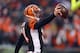 CINCINNATI, OH - DECEMBER 08: Andy Dalton #14 of the Cincinnati Bengals runs for a touchdown during the NFL game against the Indianapolis Colts at Paul Brown Stadium on December 8, 2013 in Cincinnati, Ohio. (Photo by Andy Lyons/Getty Images)
