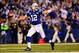 Jan 4, 2014; Indianapolis, IN, USA; Indianapolis Colts quarterback Andrew Luck (12) celebrates after throwing a touchdown pass during the fourth quarter of the 2013 AFC wild card playoff football game against the Kansas City Chiefs at Lucas Oil Stadium. C