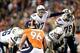 Dec 12, 2013; Denver, CO, USA; San Diego Chargers quarterback Philip Rivers (17) changes a play in the second quarter against the Denver Broncos Sports Authority Field at Mile High. Mandatory Credit: Ron Chenoy-USA TODAY Sports
