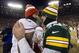 Jan 5, 2014; Green Bay, WI, USA; San Francisco 49ers quarterback Colin Kaepernick (7) greets Green Bay Packers quarterback Aaron Rodgers (12) following the 2013 NFC wild card playoff football game at Lambeau Field. San Francisco won 23-20. Mandatory Cre