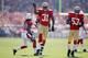 SAN FRANCISCO, CA - OCTOBER 13: Donte Whitner #31 of the San Francisco 49ers celebrates after he stopped Andre Ellington #38 of the Arizona Cardinals short of a first down at Candlestick Park on October 13, 2013 in San Francisco, California. (Photo by E