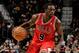 CLEVELAND, OH - NOVEMBER 30: Luol Deng #9 of the Chicago Bulls drives to the basket against the Cleveland Cavaliers at The Quicken Loans Arena on November 30, 2013 in Cleveland, Ohio. NOTE TO USER: User expressly acknowledges and agrees that, by download