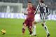 TURIN, ITALY - JANUARY 05: Giorgio Chiellini of FC Juventus #3 and Francesco Totti of AS Roma compete for the ball during the Serie A match between Juventus and AS Roma at Juventus Arena on January 5, 2014 in Turin, Italy. (Photo by Claudio Villa/Getty
