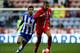 WIGAN, ENGLAND - JANUARY 04: Dele Alli of MK Dons holfds off pressure from Jordi Gomez of Wigan during the Budweiser FA Cup Third Round match between Wigan Athletic and Milton Keynes Dons at DW Stadium on January 4, 2014 in Wigan, England. (Photo by Ben