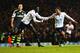 LONDON, ENGLAND - DECEMBER 29: Aaron Lennon of Tottenham Hotspur celebrates his team's third goal with Emmanuel Adebayor (L) during the Barclays Premier League match between Tottenham Hotspur and Stoke City at White Hart Lane on December 29, 2013 in Lond