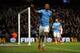 MANCHESTER, ENGLAND - DECEMBER 14: Fernandinho of Manchester City celebrates scoring their fifth goal past Wojciech Szczesny of Arsenal during the Barclays Premier League match between Manchester City and Arsenal at Etihad Stadium on December 14, 2013 in