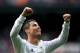 MADRID, SPAIN - NOVEMBER 09: Cristiano Ronaldo of Real Madrid CF celebrates scoring their fifth goal during the La Liga match between Real Madrid CF and Real Sociedad de Futbol at Estadio Santiago Bernabeu on November 9, 2013 in Madrid, Spain. (Photo b