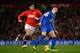 MANCHESTER, ENGLAND - DECEMBER 04: Marouane Fellaini of Manchester United competes with Ross Barkley of Everton during the Barclays Premier League match between Manchester United and Everton at Old Trafford on December 4, 2013 in Manchester, England. (P
