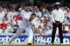 LONDON, ENGLAND - AUGUST 21: Chris Woakes of England fails to stop the ball watched by umpire Kumar Dharmasena during day one of the 5th Investec Ashes Test match between England and Australia at the Kia Oval on August 21, 2013 in London, England. (Phot