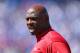 LEXINGTON, KY - SEPTEMBER 14: Charlie Strong the head coach of the Louisville Cardinals gives instructions to his team during the game against the Kentucky Wildcats at Commonwealth Stadium on September 14, 2013 in Lexington, Kentucky. (Photo by Andy Lyon