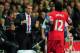 SWANSEA, WALES - SEPTEMBER 16: Liverpool striker Victor Moses (r) celebrates after scoring the second Liverpool goal with manager Brendan Rodgers during the Barclays Premier League match between Swansea City and Liverpool at Liberty Stadium on September