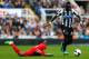 NEWCASTLE-UPON-TYNE, ENGLAND - OCTOBER 19: Cheick Tiote (R) of Newcastle in action with Victor Moses of Liverpool during the Barclays Premier League match between Newcastle United and Liverpool at St James' Park on October 19, 2013 in Newcastle-Upon-Tyne,