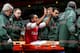 LONDON, ENGLAND - JANUARY 04: The injured Theo Walcott of Arsenal makes a 2-0 gesture to the Tottenham fans as he is stretchered off the pitch during the Budweiser FA Cup third round match between Arsenal and Tottenham Hotspur at Emirates Stadium on Janu