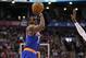 Dec 28, 2013; Toronto, Ontario, CAN; New York Knicks guard Tim Hardaway Jr. (5) hits a three-point shot against the Toronto Raptors at Air Canada Centre. The Raptors beat the Knicks 115-100. Mandatory Credit: Tom Szczerbowski-USA TODAY Sports
