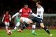 LONDON, ENGLAND - JANUARY 04: Serge Gnabry of Arsenal and Vlad Chiriches of Spurs compete for the ball during the Budweiser FA Cup third round match between Arsenal and Tottenham Hotspur at Emirates Stadium on January 4, 2014 in London, England. (Photo