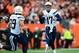 Jan 5, 2014; Cincinnati, OH, USA; San Diego Chargers quarterback Philip Rivers (17) scrambles out of the pocket during first quarter of the AFC wild card playoff football game against the Cincinnati Bengals at Paul Brown Stadium. Mandatory Credit: Andrew