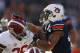 AUBURN, AL - NOVEMBER 30: Corey Grant #20 of the Auburn Tigers is tackled by Landon Collins #26 of the Alabama Crimson Tide in the first half at Jordan-Hare Stadium on November 30, 2013 in Auburn, Alabama. (Photo by Kevin C. Cox/Getty Images)