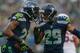 SEATTLE, WA - DECEMBER 22: Cornerback Richard Sherman #25 of the Seattle Seahawks celebrates with free safety Earl Thomas #29 after making an interception against the Arizona Cardinals at CenturyLink Field on December 22, 2013 in Seattle, Washington. (P