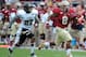 Nov 23, 2013; Tallahassee, FL, USA; Florida State Seminoles running back Devonta Freeman (8) runs for a touchdown past Idaho Vandals cornerback Delency Parham (27) during the first half at Doak Campbell Stadium. Mandatory Credit: Melina Vastola-USA TODAY
