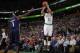 BOSTON, MA - JANUARY 3: Courtney Lee #11 of the Boston Celtics shoots the ball against Tyreke Evans #1 of the New Orleans Pelicans on January 3, 2014 at the TD Garden in Boston, Massachusetts. NOTE TO USER: User expressly acknowledges and agrees that, by