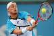 BRISBANE, AUSTRALIA - JANUARY 05: Lleyton Hewitt of Australia plays a backhand in his mens final match against Roger Federer of Switzerland during day eight of the 2014 Brisbane International at Queensland Tennis Centre on January 5, 2014 in Brisbane, Au