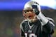FOXBORO, MA - DECEMBER 29: Tom Brady #12 of the New England Patriots reacts after a touchdown by LeGarrette Blount during a game with the Buffalo Bills at Gillette Stadium on December 29, 2013 in Foxboro, Massachusetts. (Photo by Jim Rogash/Getty Images)
