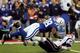 INDIANAPOLIS - JANUARY 21: Robert Mathis #98 of the Indianapolis Colts knocks down Tom Brady #12 of the New England Patriots during the AFC Championship Game on January 21, 2007 at the RCA Dome in Indianapolis, Indiana. (Photo by Doug Pensinger/Getty Im