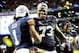 Dec 7, 2013; Atlanta, GA, USA; Auburn Tigers wide receiver Trovon Reed (1) and Auburn Tigers offensive linesman Greg Robinson (73) celebrate after the 2013 SEC Championship game against the Missouri Tigers at Georgia Dome. The Auburn Tigers defeated the M