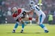 SAN FRANCISCO, CA - NOVEMBER 10: Mario Manningham #82 of the San Francisco 49ers is tackled by Captain Munnerlyn #41 and Luke Kuechly #59 of the Carolina Panthers at Candlestick Park on November 10, 2013 in San Francisco, California. (Photo by Ezra Shaw