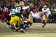 GREEN BAY, WI - JANUARY 05: Frank Gore #21 of the San Francisco 49ers scores a 10 yard touchdown in the second quarter against the Green Bay Packers during their NFC Wild Card Playoff game at Lambeau Field on January 5, 2014 in Green Bay, Wisconsin. (P