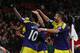 MANCHESTER, ENGLAND - JANUARY 05: Wilfried Bony of Swansea City celebrates with his team-mates after scoring his team's second goal during the FA Cup with Budweiser Third round match between Manchester United and Swansea City at Old Trafford on January 5