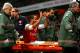 LONDON, ENGLAND - JANUARY 04: The injured Theo Walcott of Arsenal makes a 2-0 gesture to the Tottenham fans as he is stretchered off the pitch during the Budweiser FA Cup third round match between Arsenal and Tottenham Hotspur at Emirates Stadium on Janu