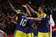 MANCHESTER, ENGLAND - JANUARY 05: Wilfried Bony of Swansea City celebrates with his team-mates after scoring his team's second goal during the FA Cup with Budweiser Third round match between Manchester United and Swansea City at Old Trafford on January 5
