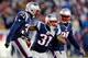 FOXBORO, MA - NOVEMBER 24: Cornerback Aqib Talib #31, free safety Devin McCourty #32, and defensive end Chandler Jones #95 of the New England Patriots celebrate a defensive play against the Denver Broncos during a game at Gillette Stadium on November 24