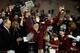 PASADENA, CA - JANUARY 06: Florida State Seminoles head coach Jimbo Fisher celebrates with his team in front of the Coaches' Trophy after defeating the Auburn Tigers 34-31 in the 2014 Vizio BCS National Championship Game at the Rose Bowl on January 6, 20