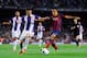 BARCELONA, SPAIN - OCTOBER 05: Christian Tello of FC Barcelona duels for the ball with Antonio Rukavina of Real Valladolid CF during the La Liga match between FC Barcelona and Real Valladolid CF at Camp Nou on October 5, 2013 in Barcelona, Spain. (Photo
