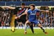 LONDON, ENGLAND - DECEMBER 14: (L-R) Joel Ward of Crystal Palace and Juan Mata of Chelsea challenge for the ball during the Barclays Premier League match between Chelsea and Crystal Palace at Stamford Bridge on December 14, 2013 in London, England. (Pho